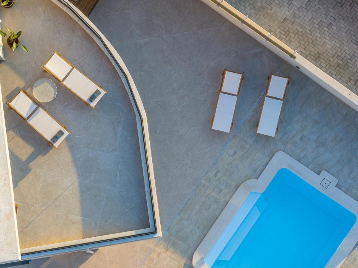 Anassa Suites อายิโอสนิโกลาโอส ภายนอก รูปภาพ